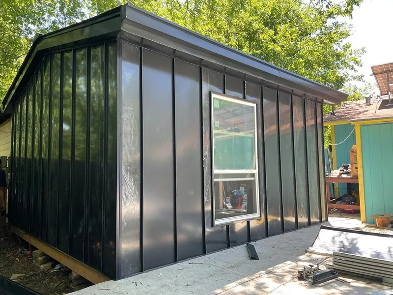 Black standing seam metal wall panels for Roof Inspection in Ashwaubenon