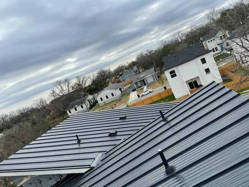 Standing seam metal roof panels with vents for Skylight Repair in Ashwaubenon